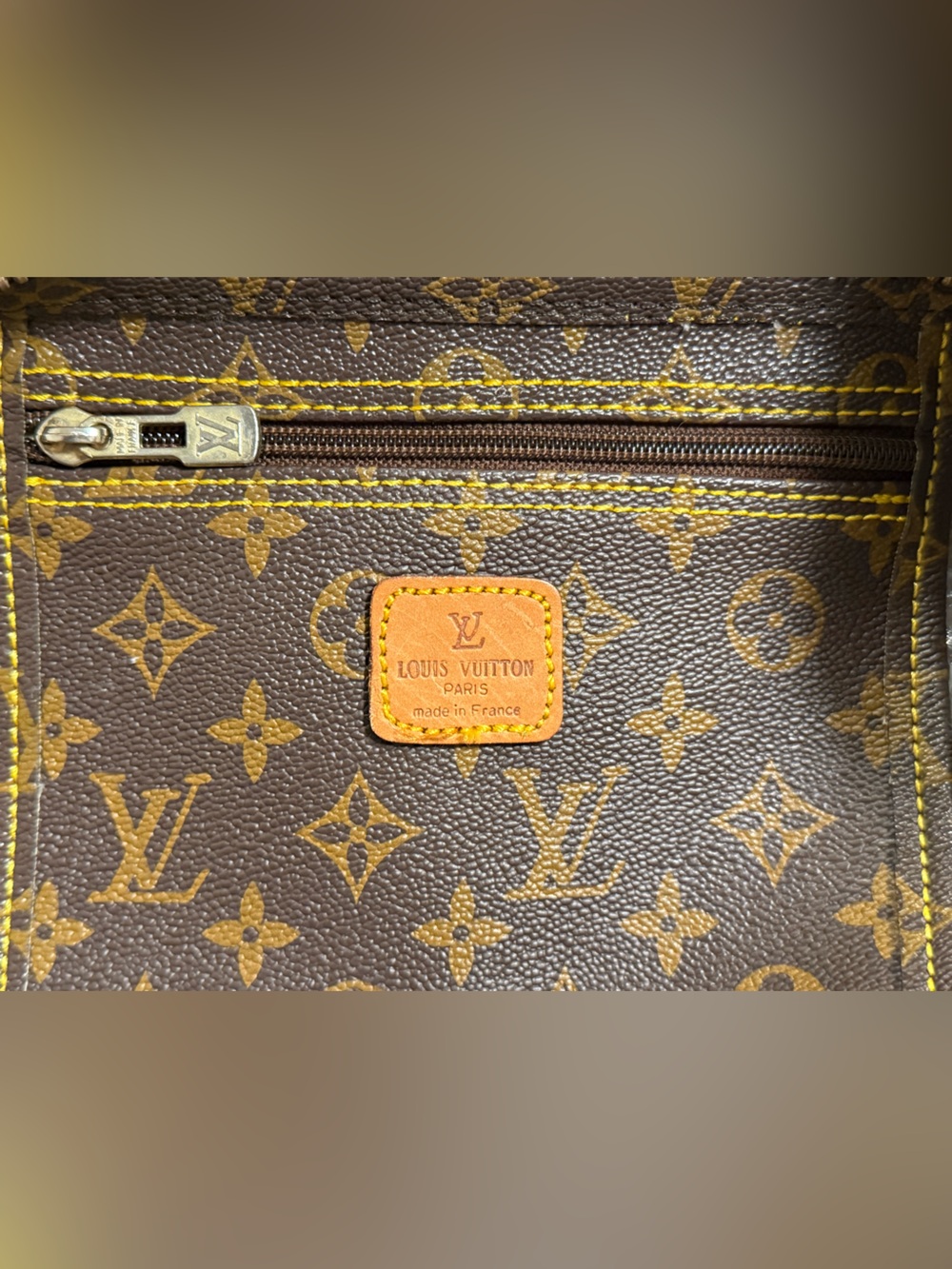 Louis Vuitton Monogram Duffel in Brown with Tan Trim. - Picture 15 of 16